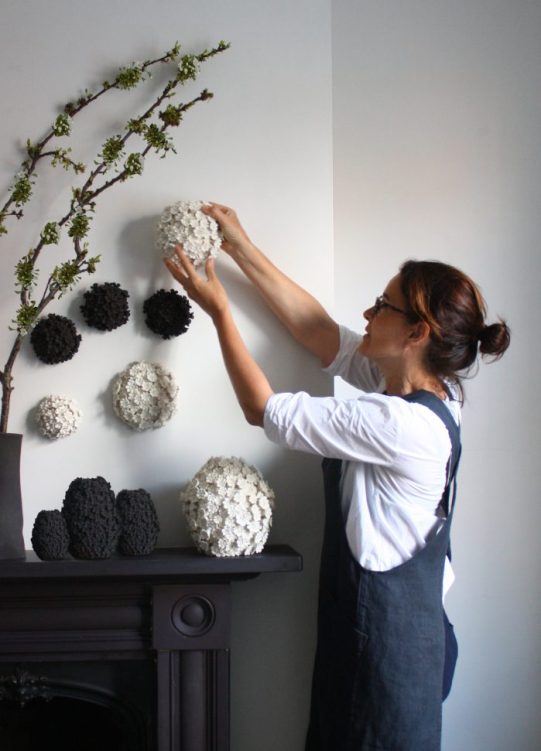 Vanessa Hogge with white wall flower - British Design Edit blog- Charis White