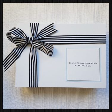 Charis White Interiors Styling Box with black and white striped ribbon